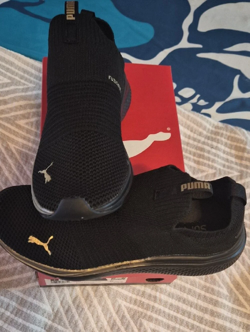 Puma Men’s Black Slip-On Knit Sneakers with Gold Trim